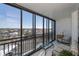 Private balcony with seating and city views at 627 Alhambra Rd # 601, Venice, FL 34285