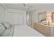 Spacious bedroom with a dresser and large closet at 627 Alhambra Rd # 601, Venice, FL 34285