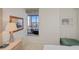 Bedroom with ocean view and built-in seating at 627 Alhambra Rd # 601, Venice, FL 34285
