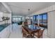 Open concept dining room with kitchen and living room views at 627 Alhambra Rd # 601, Venice, FL 34285