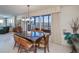 Dining room with glass-top table and view at 627 Alhambra Rd # 601, Venice, FL 34285