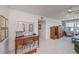 Bright living room with ocean view and a convenient desk area at 627 Alhambra Rd # 601, Venice, FL 34285