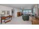 Spacious living room with ocean views and comfortable seating at 627 Alhambra Rd # 601, Venice, FL 34285
