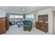 Living room features ocean views and a wooden cabinet at 627 Alhambra Rd # 601, Venice, FL 34285