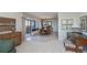 Open living space with access to balcony and ocean views at 627 Alhambra Rd # 601, Venice, FL 34285