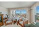 Living room offers ample seating and breathtaking ocean views at 627 Alhambra Rd # 601, Venice, FL 34285