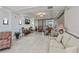 Relaxing condo lobby with comfortable seating and large windows at 627 Alhambra Rd # 601, Venice, FL 34285