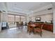 Condo lounge with tables and chairs, suitable for gatherings at 627 Alhambra Rd # 601, Venice, FL 34285