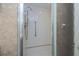 Walk-in shower with grab bar for accessibility at 627 Alhambra Rd # 601, Venice, FL 34285