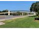 View of a roadway with a pedestrian overpass at 634 Bird Bay E Dr # 103, Venice, FL 34285