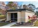 Well-maintained community building with landscaping at 6401 Floral Ct, North Port, FL 34287