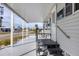 Inviting front porch with steps and a view of the street at 6401 Floral Ct, North Port, FL 34287