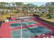 Two well-maintained tennis courts available for residents at 6401 Floral Ct, North Port, FL 34287