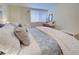 Main bedroom with a comfortable bed and calming decor at 647 White Pine Tree Rd # 34, Venice, FL 34285
