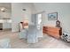 Charming dining area with wooden drop leaf table and seating for four at 647 White Pine Tree Rd # 34, Venice, FL 34285