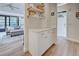 Open kitchen with white cabinets and additional counter space at 647 White Pine Tree Rd # 34, Venice, FL 34285