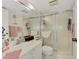 Clean bathroom with shower/tub combo, vanity, and linen storage at 756 White Pine Tree Rd # 211, Venice, FL 34285