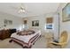 Cozy bedroom with a queen-size bed and ample closet space at 756 White Pine Tree Rd # 211, Venice, FL 34285
