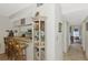 Kitchen features a breakfast bar and updated cabinetry at 756 White Pine Tree Rd # 211, Venice, FL 34285