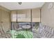 Relaxing lanai with seating, perfect for enjoying the outdoors at 756 White Pine Tree Rd # 211, Venice, FL 34285