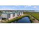 A picturesque pond enhances the beauty of this condo complex at 9203 Griggs Rd # B202, Englewood, FL 34224