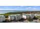 Scenic aerial of condo buildings near the water with ample parking at 9203 Griggs Rd # B202, Englewood, FL 34224