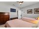 Guest bedroom with twin beds and bathroom access at 1010 Grouse Way, Venice, FL 34285