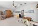 Home exercise room with stationary bike and sitting area at 1010 Grouse Way, Venice, FL 34285