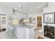 Spacious kitchen with granite countertops and white cabinetry at 1010 Grouse Way, Venice, FL 34285