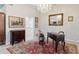 Charming home office with antique furniture and a decorative rug at 1010 Grouse Way, Venice, FL 34285
