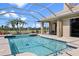Inviting swimming pool with screened enclosure at 1010 Grouse Way, Venice, FL 34285