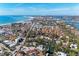Wide aerial showcasing beach and waterways at 110 Vista Hermosa Cir # 102B, Sarasota, FL 34242