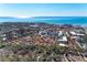 Aerial view of a condo community near the ocean, highlighting a specific unit at 110 Vista Hermosa Cir # 102B, Sarasota, FL 34242