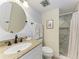 Bathroom with granite vanity and walk-in shower at 110 Vista Hermosa Cir # 102B, Sarasota, FL 34242