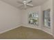 Bedroom with corner window and ceiling fan at 1102 Auburn Cove Cir, Venice, FL 34292
