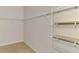 Large walk-in closet with wire shelving at 1102 Auburn Cove Cir, Venice, FL 34292