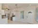 Dining room adjacent to kitchen and entrance at 1102 Auburn Cove Cir, Venice, FL 34292