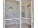 Front door entrance with a white door, screen door, and tiled flooring at 1102 Auburn Cove Cir, Venice, FL 34292