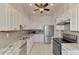Modern kitchen with stainless steel appliances and granite countertops at 1102 Auburn Cove Cir, Venice, FL 34292