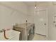 Laundry room with washer, dryer, and utility sink at 1102 Auburn Cove Cir, Venice, FL 34292