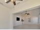 Open concept living room with view of kitchen and entrance at 1102 Auburn Cove Cir, Venice, FL 34292