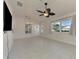Living room with tile floors and plenty of natural light at 1102 Auburn Cove Cir, Venice, FL 34292