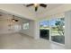 Sunroom with view into living room and access to outside at 1102 Auburn Cove Cir, Venice, FL 34292