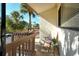 Private balcony with seating overlooking lush landscape, perfect for enjoying the outdoors at 1106 Bird Bay Way # 316, Venice, FL 34285