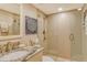 Modern bathroom with walk-in shower, granite vanity and updated fixtures at 1106 Bird Bay Way # 316, Venice, FL 34285