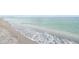 Scenic beach view with calm ocean waves at 1106 Bird Bay Way # 316, Venice, FL 34285