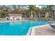 Refreshing community pool with surrounding patio at 1106 Bird Bay Way # 316, Venice, FL 34285