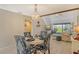 Bright dining area with round table and four chairs at 1106 Bird Bay Way # 316, Venice, FL 34285