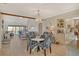 Bright dining area with seating for four and view to living room at 1106 Bird Bay Way # 316, Venice, FL 34285