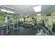 Well-equipped fitness center with treadmills, ellipticals, and weight machines at 1106 Bird Bay Way # 316, Venice, FL 34285